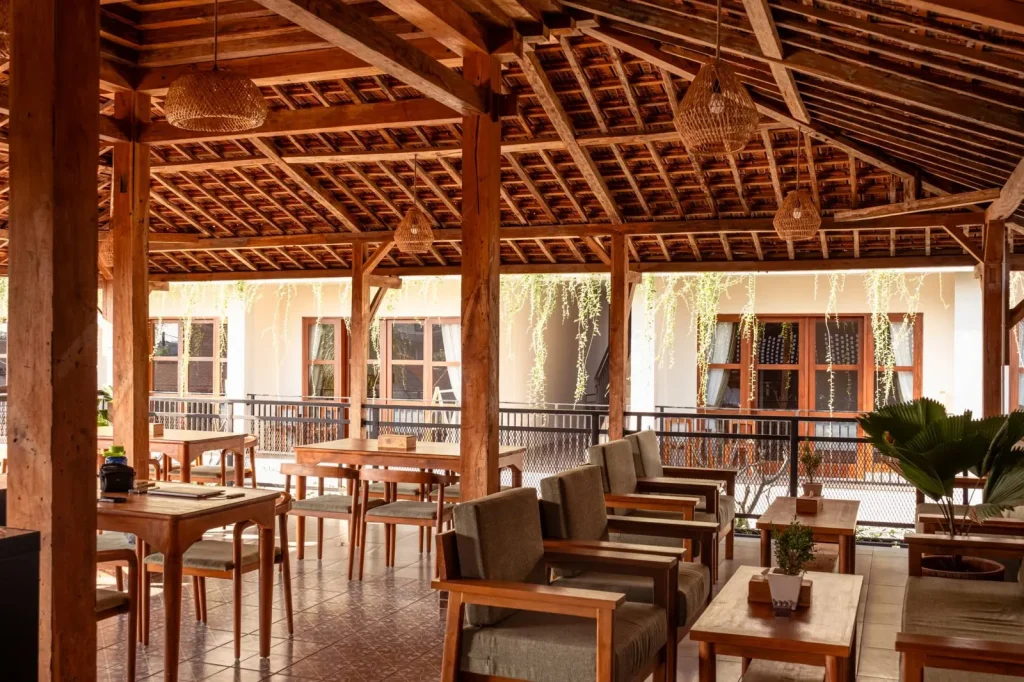 Lounge chairs and tables under the Joglo roof