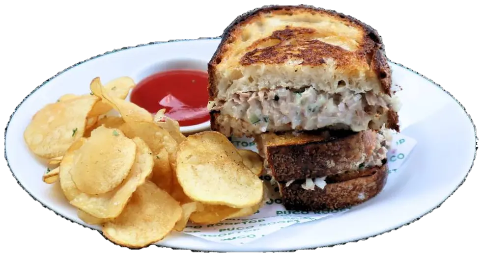 Tuna melt sandwich with potato chips