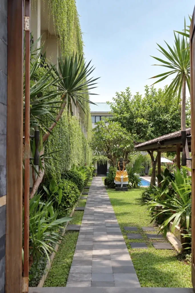 Garden path lined with hanging vines